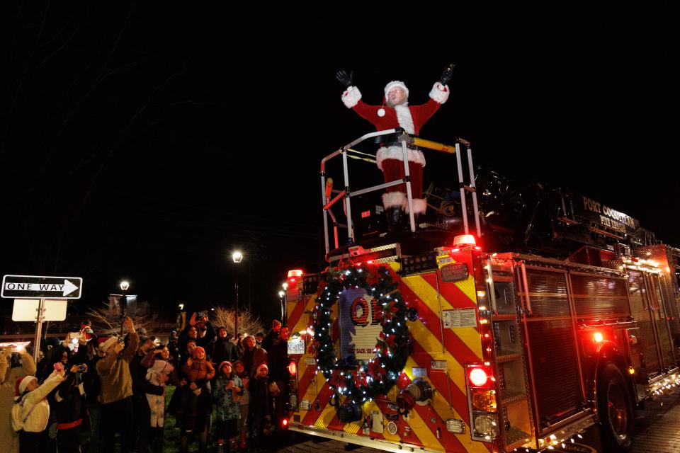 Santa on fire truck in the parade